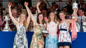 Mathilda Hodgkins-Bryne, Melissa Wilson, Holly Nixon and Jess Leyden lift the Princess Grace Challenge Cup © Henley Royal Regatta