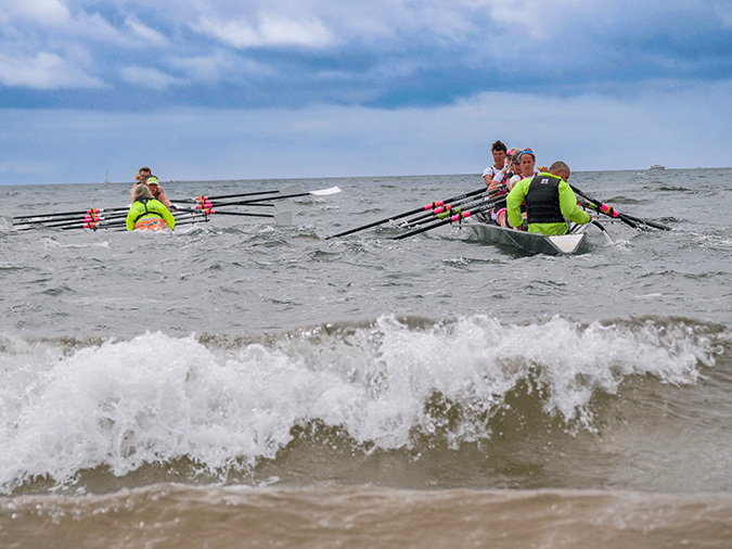 Offshore coastal sculling race in quads