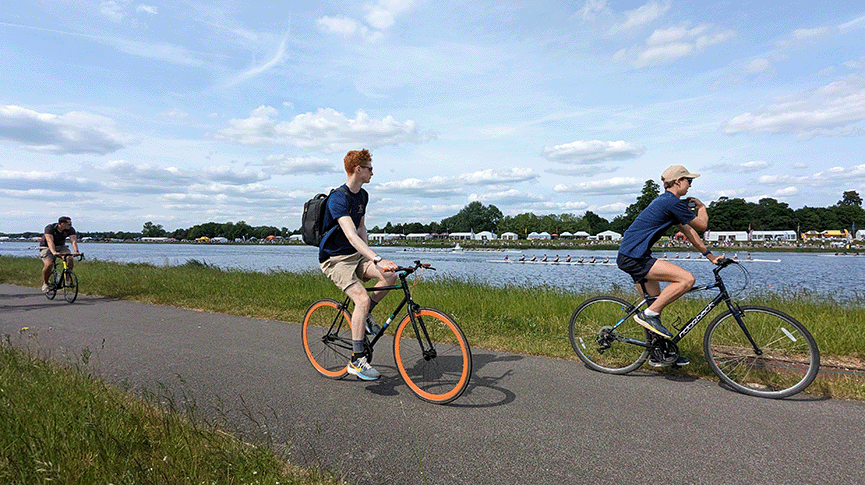 cyclists following a rowing race