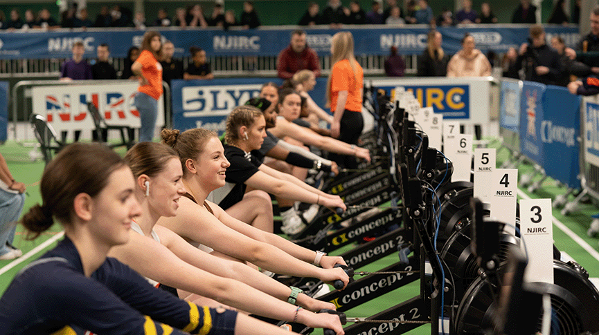 Young peple at indoor rowing competition