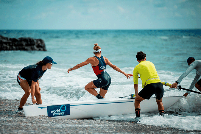 Beach Sprint athlete jumping out of boat