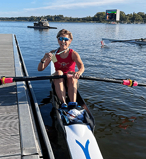 Woman with medal in single scull