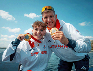 Lauren Rowles and Gregg Stevenson with medals